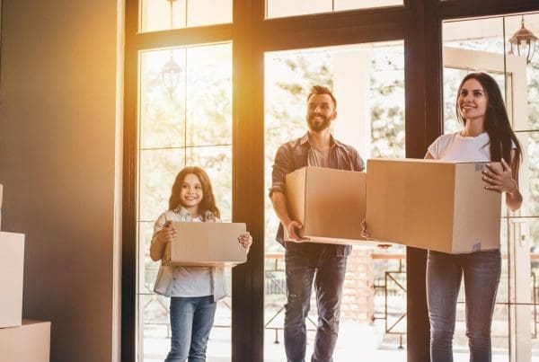 Family holding boxes